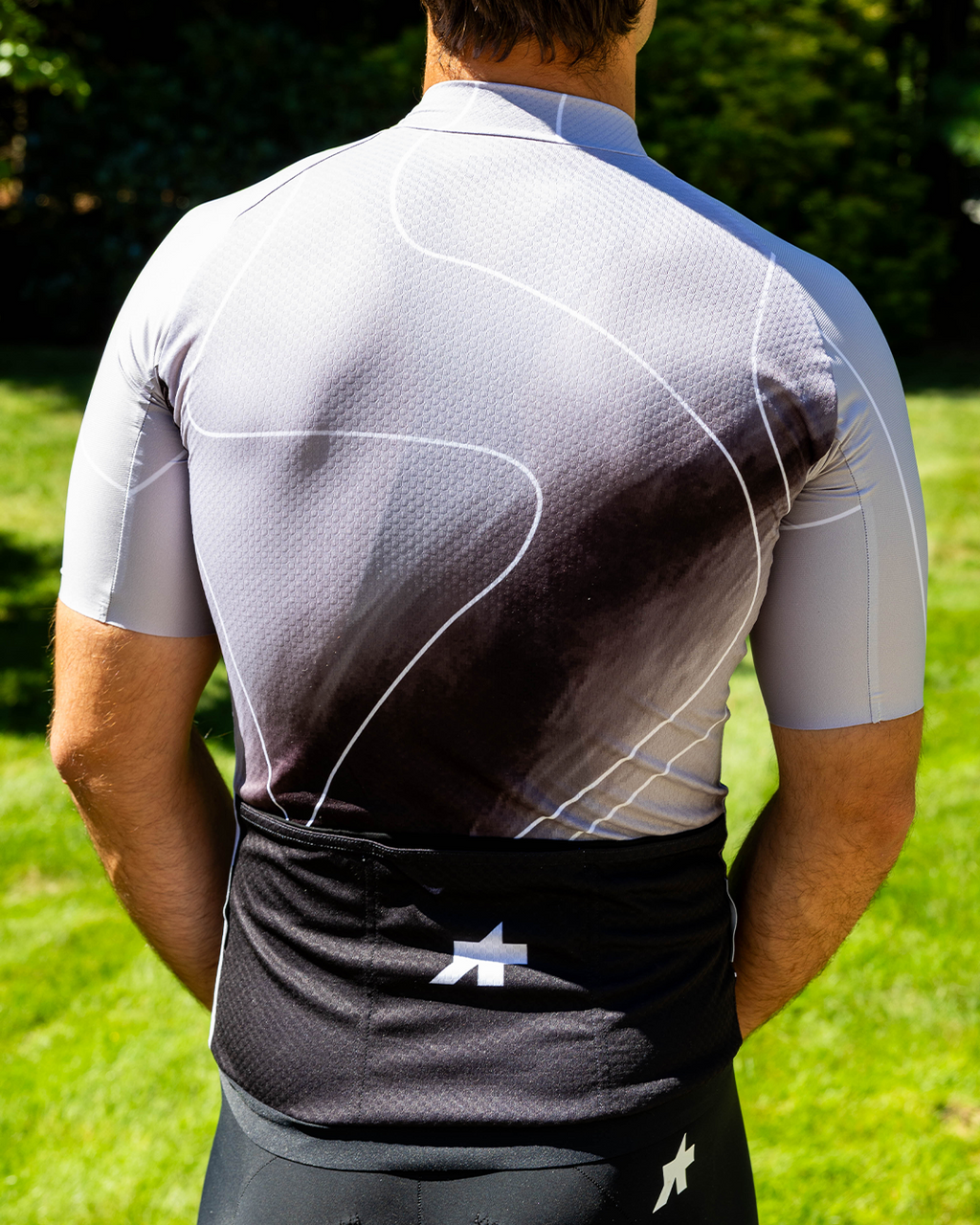 Back of the Pathfinder jersey showing the rear pockets and gripper hem